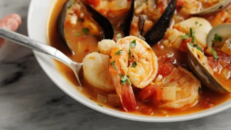 Bowl of Seafood Soup with Shrimp, Scallops, Mussels, and Clams